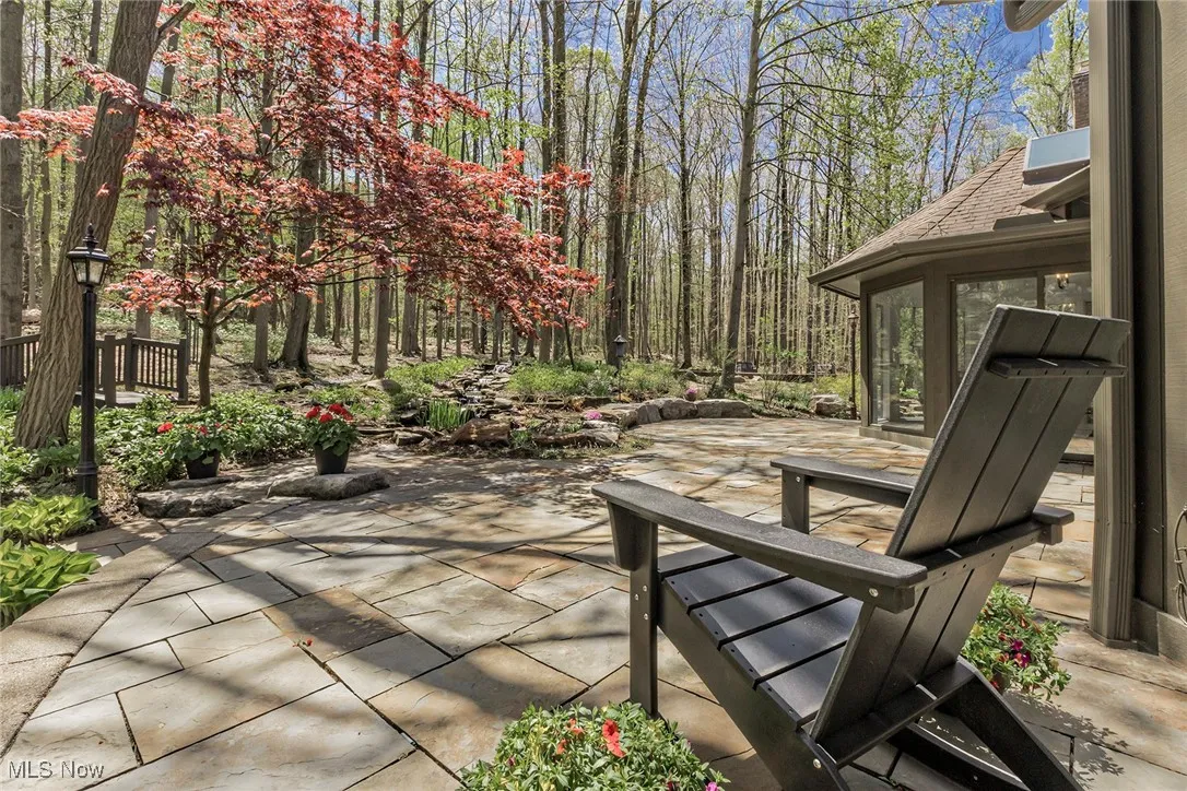 View of patio / stone terrace.  Note the bridge.