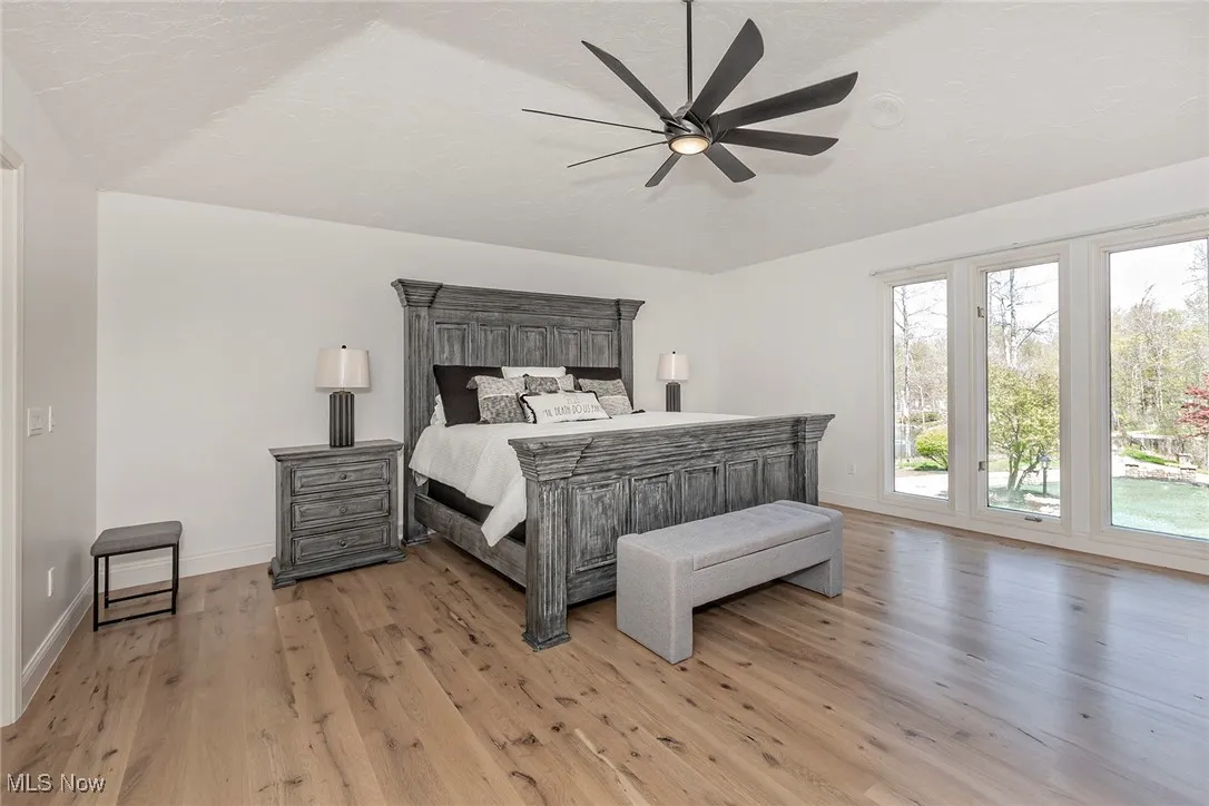 Master Bedroom Suite with its neutral backdrop will accommodate any size or style of furniture. Note the vaulted ceiling and beautiful ceiling fan