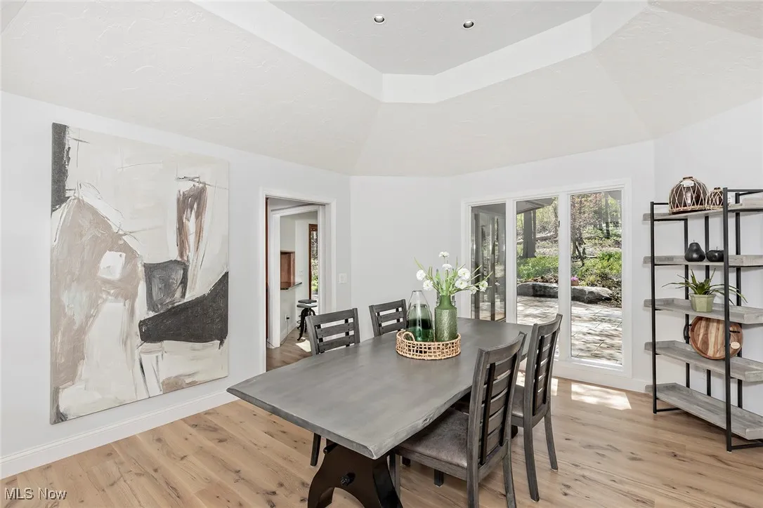 Dining Room is oversized to accommodate your largest furniture. Tray ceiling, wood flooring.