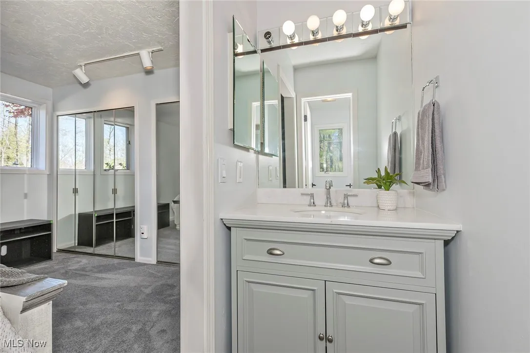 Full ensuite Bath and Jack-n-Jill full baths offer direct access to the three same-sized bedrooms.  All baths have myriad renovations