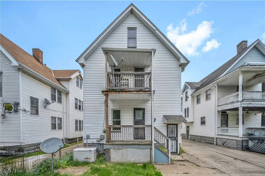 Rear view of house featuring a balcony