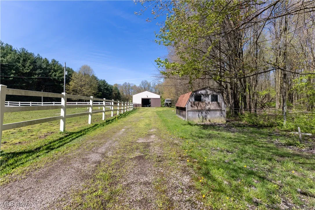 View of road featuring driveway