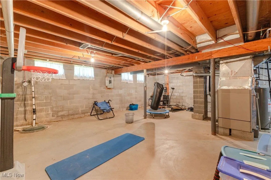 Basement with heating unit and gas water heater