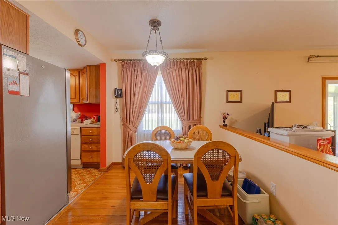 Dining room featuring plenty of natural light and light wood-style flooring