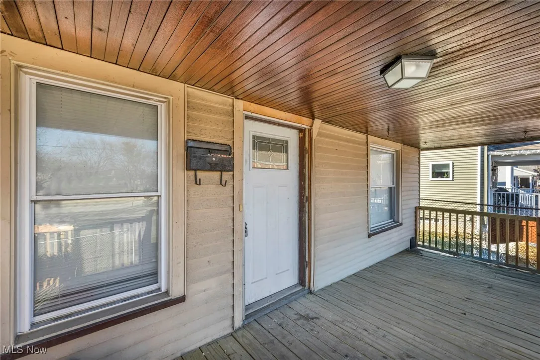 Wooden deck with covered porch