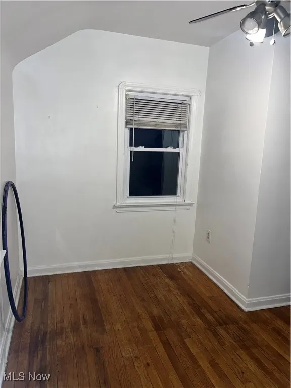 Bedroom with a ceiling fan,wood flooring