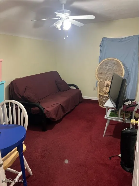 Bedroom featuring a textured ceiling and a ceiling fan