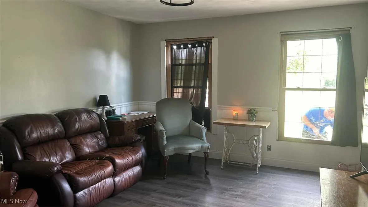 this room is at front of home off the kitchen area and could be used as a dining room.