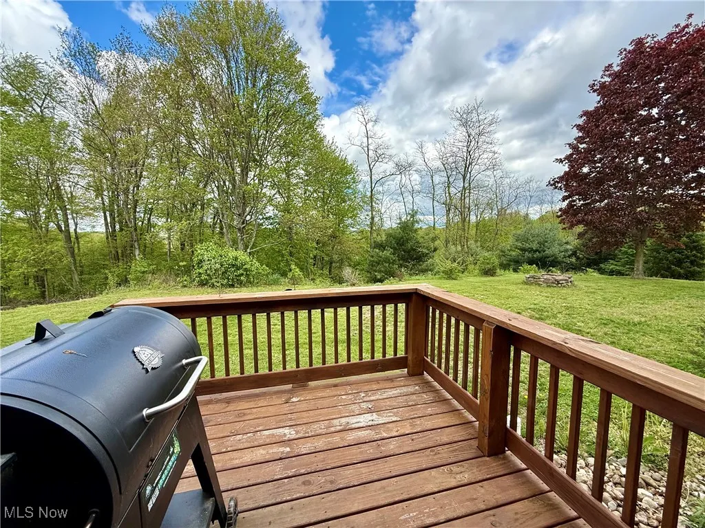 Deck with grilling area and a yard