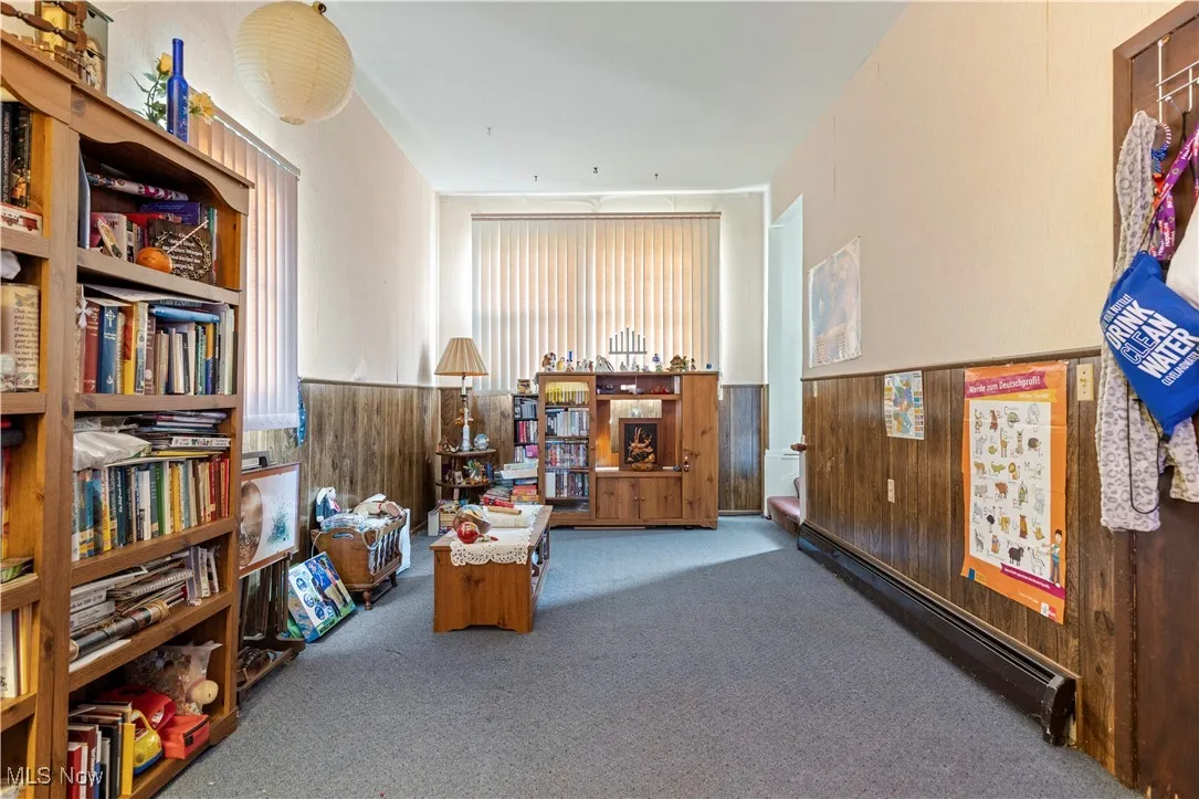 Miscellaneous room featuring carpet floors