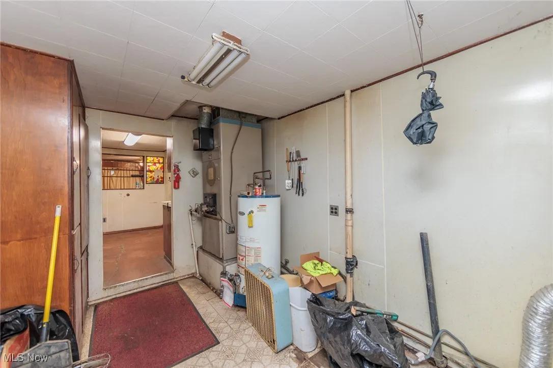 Basement featuring gas water heater