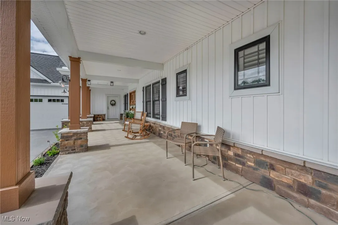 View of patio with a porch