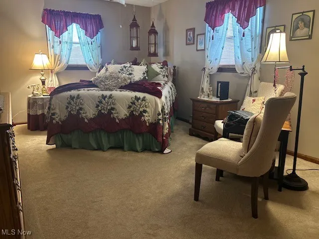 Large Bedroom with ample seating and storage.