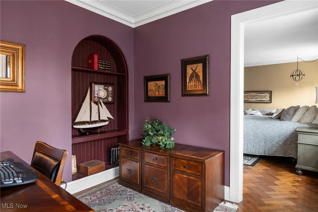 Home office with ornamental molding