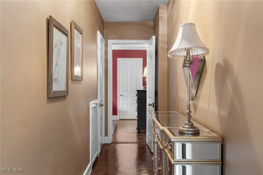 Hall featuring baseboards