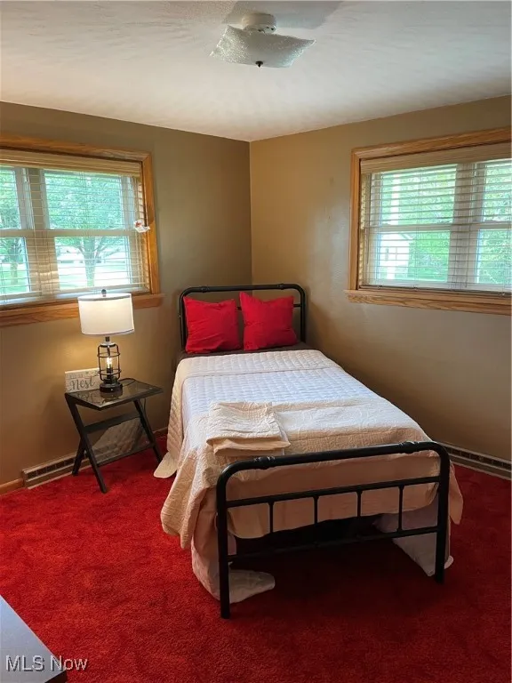 Bedroom featuring carpet