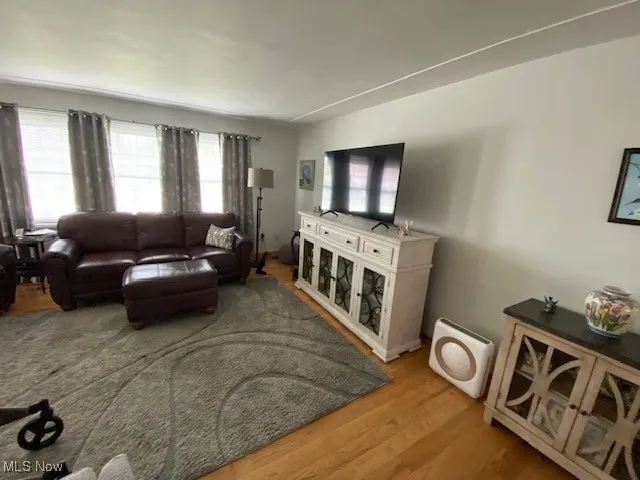 Living room with wood finished floors
