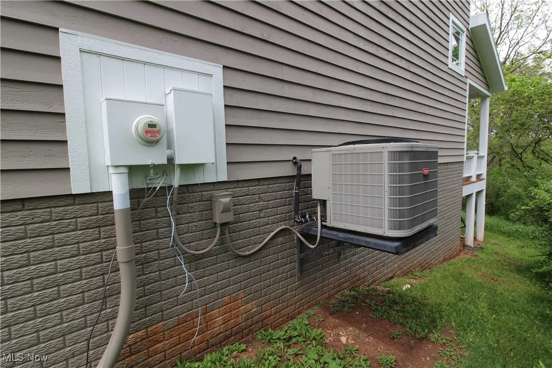 Exterior view of central AC and electric meter