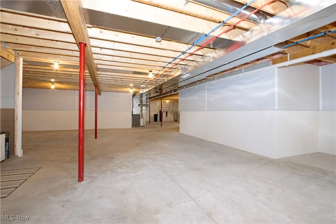 Unfinished basement with heating unit