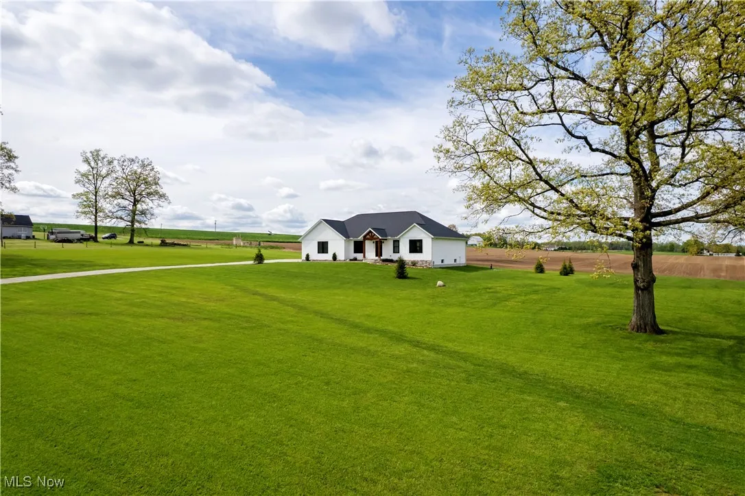 View of front of house with a front lawn