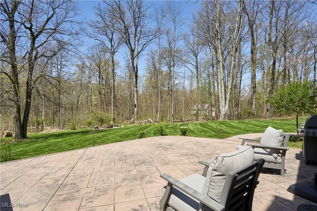 View of patio featuring area for grilling