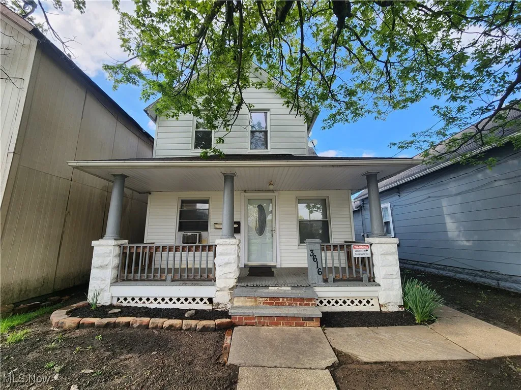 View of front of property featuring covered porch