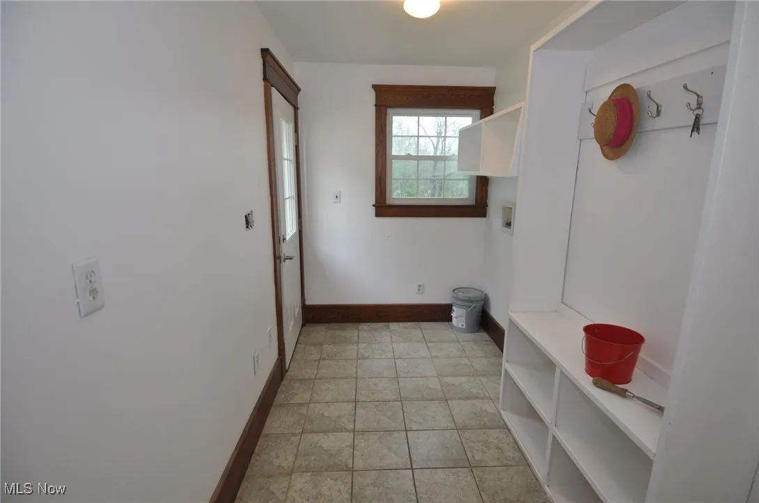 Mudroom featuring baseboards