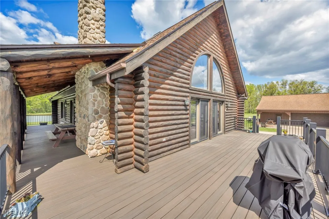 Wooden deck with attached grill