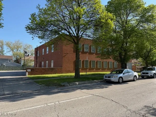 View of front of property with brick siding