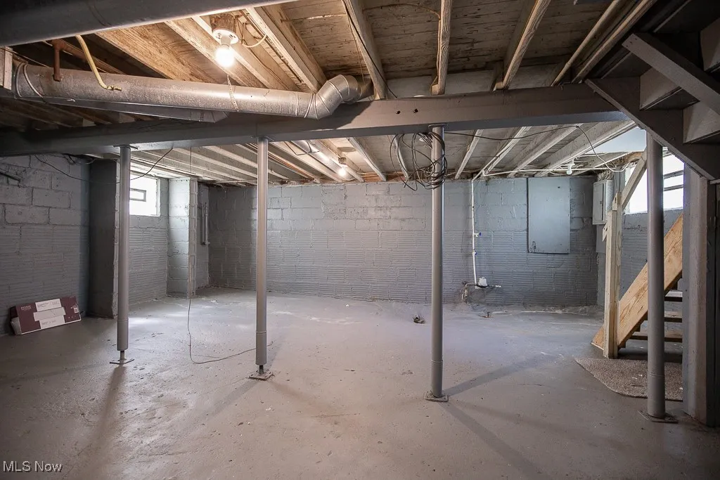 Basement featuring stairway