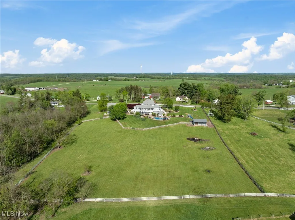 Aerial view of sparsely populated area with agricultural land