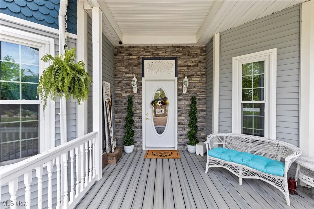 Entrance to property with a porch