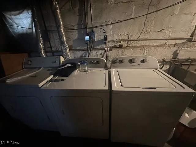 Laundry area featuring washer and clothes dryer