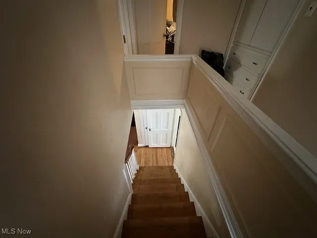 Staircase with wood finished floors