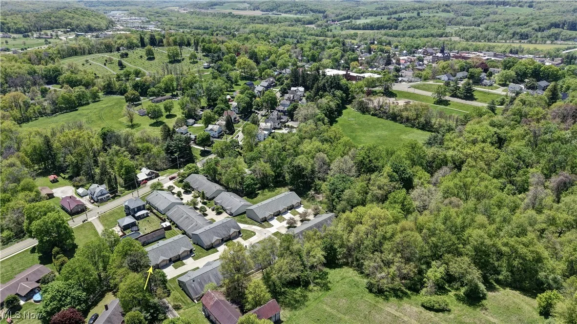 View of property and proximity to yown