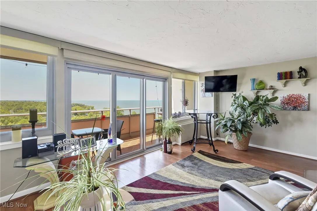 Living room featuring wood finished floors and baseboards