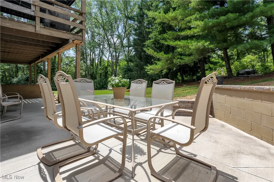 View of patio featuring outdoor dining area