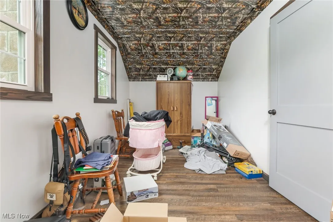 Below grade area featuring wood finished floors