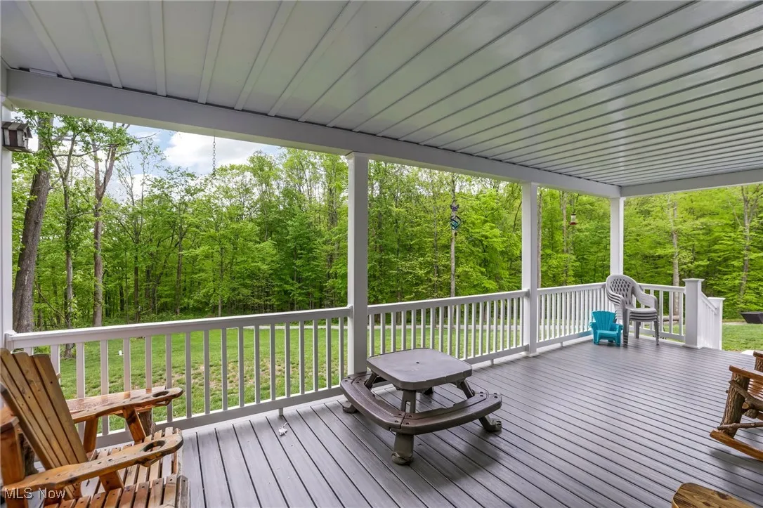 Wooden terrace with a view of trees