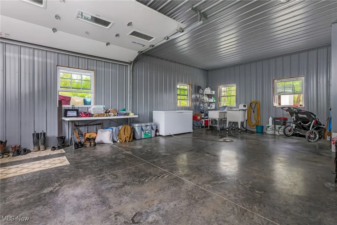 Garage featuring refrigerator