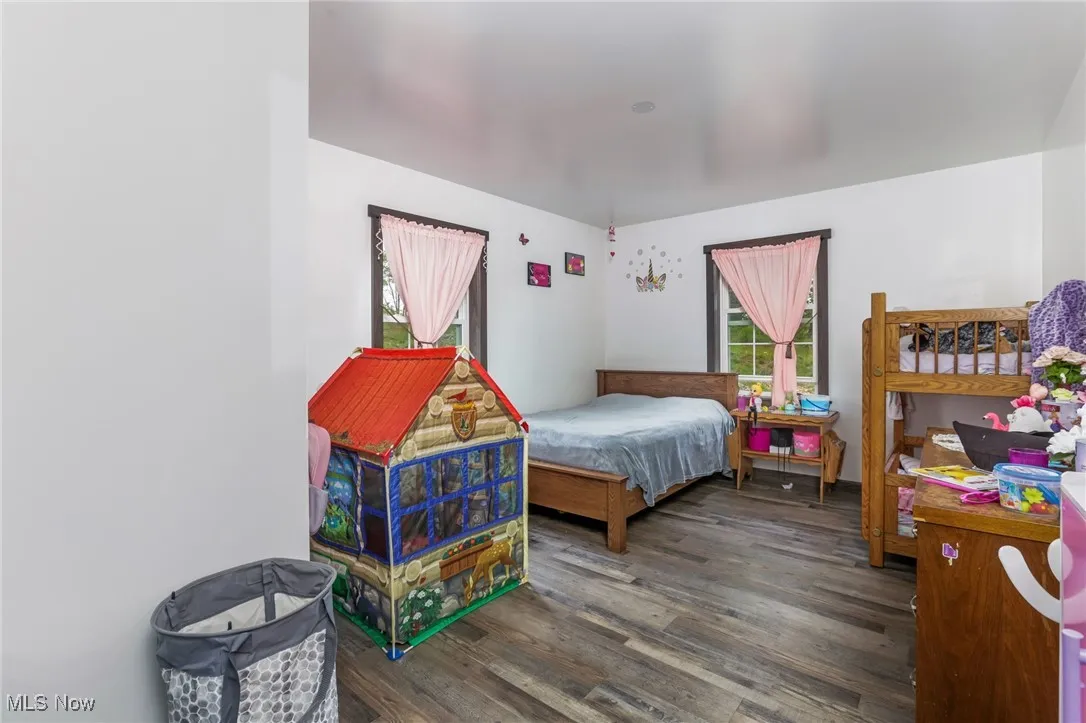 Bedroom featuring wood finished floors