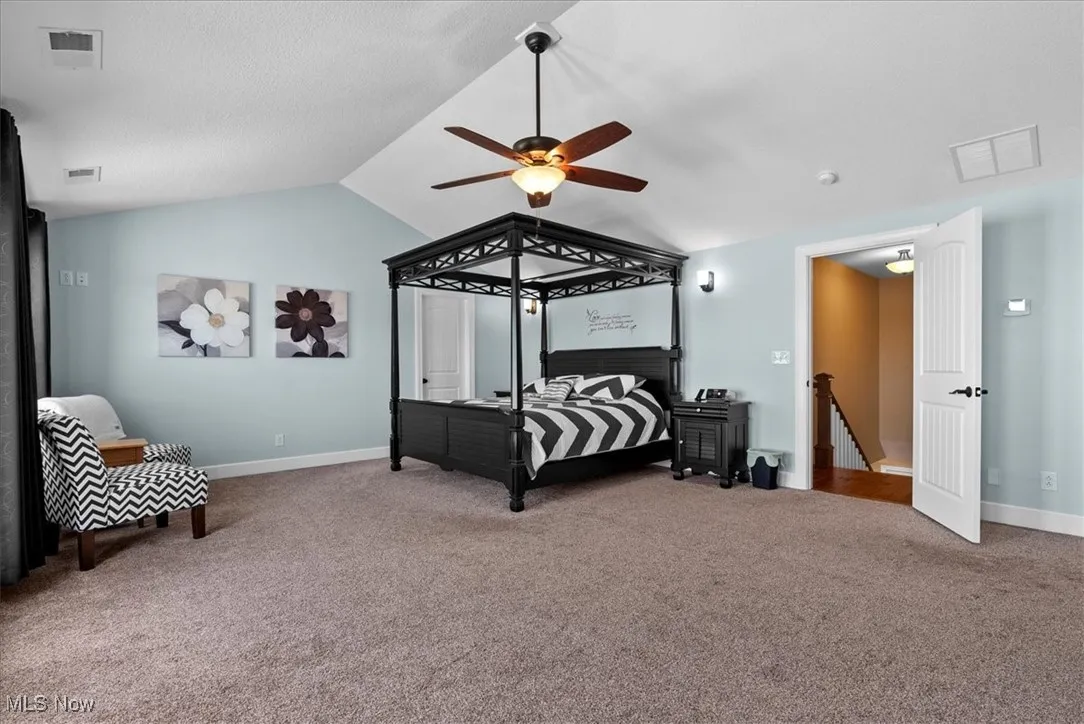 At the top of the stairs is the primary suite