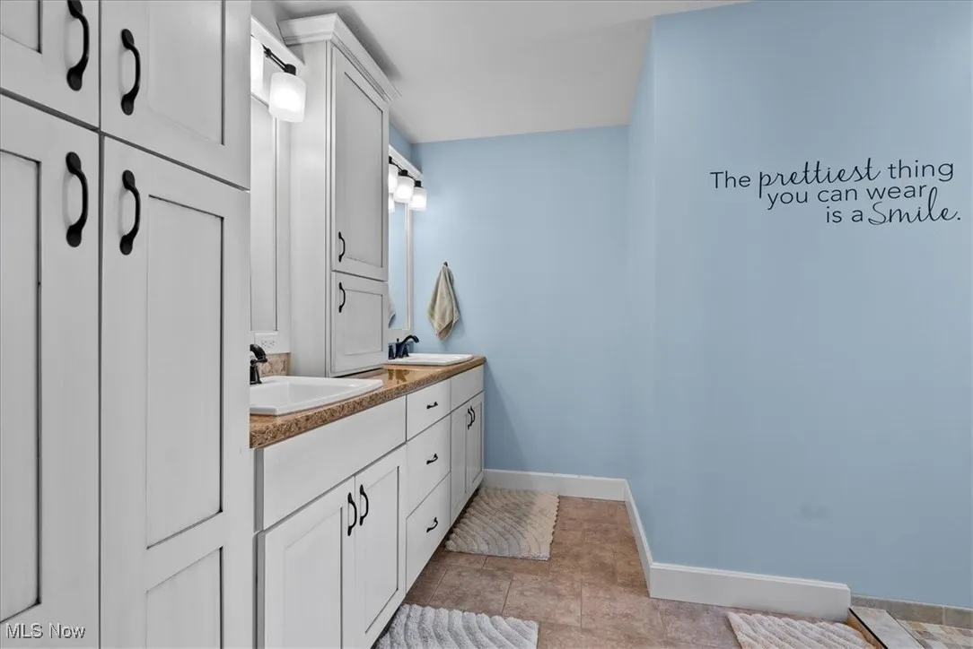 Primary full bathroom in the primary suite...