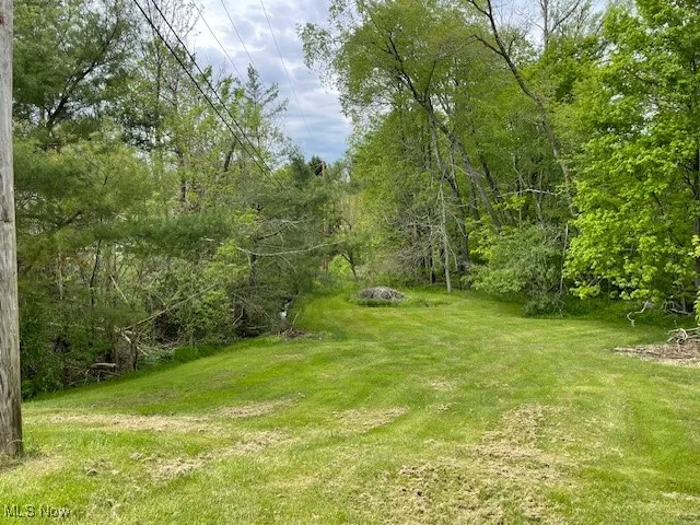 View of green lawn West side of Home