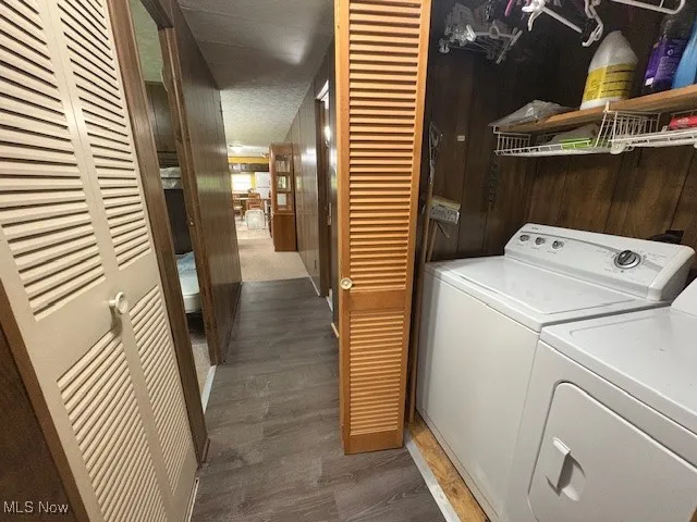 Laundry area in hallway,  appliance all stay.