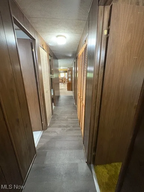 Standing at bedroom doorway down the hallway towards Kitchen
