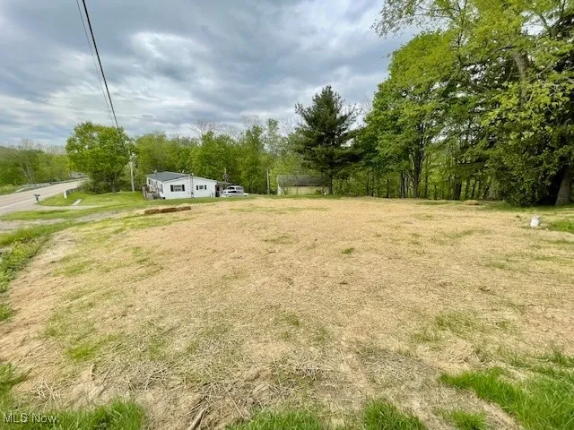East View across the land that once had a home on it towards the Home.