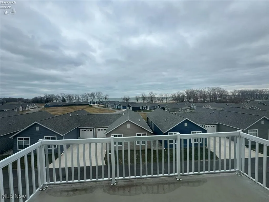 Balcony featuring a residential view