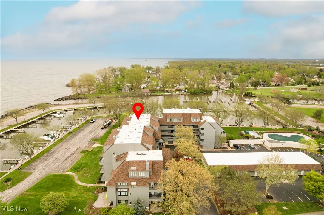 Bird's eye view of a nearby body of water and apartment complex