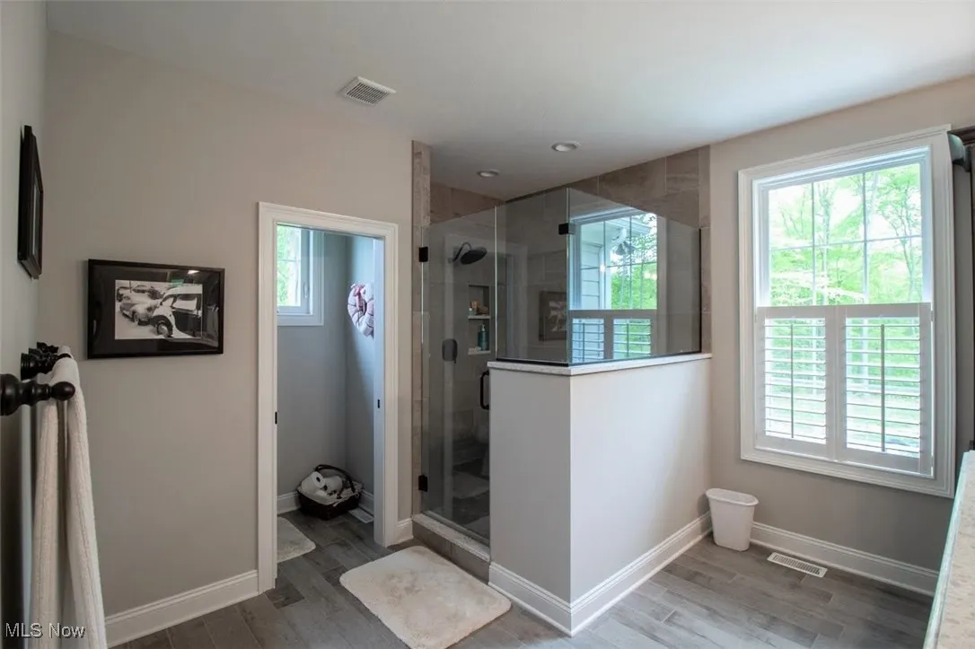 Virtually staged Master Bathroom with a custom shower